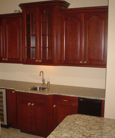 Wet Bar with increased depths and elevations adds elegance.